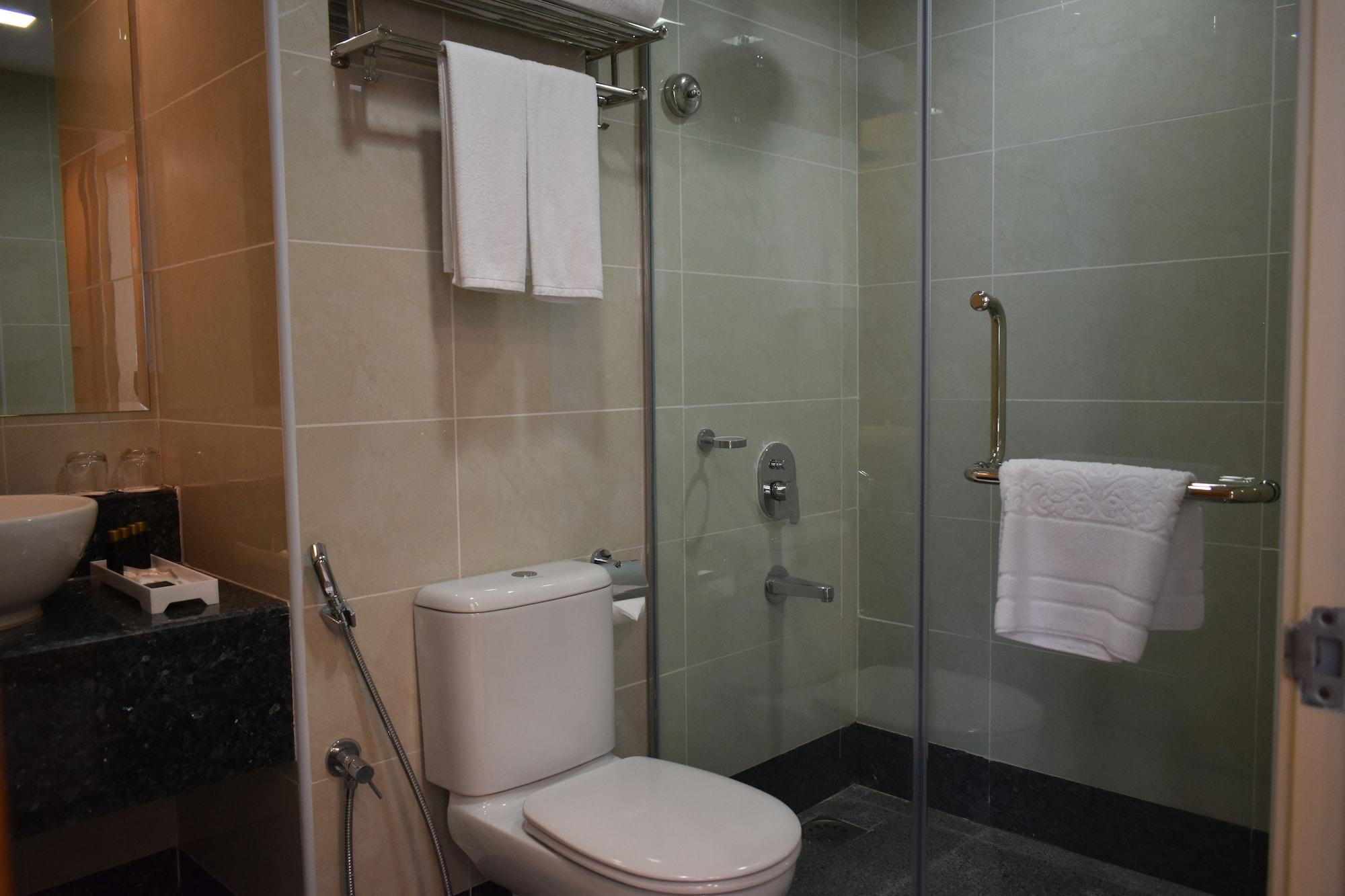 Tenera Hotel Bangi Kültér fotó Bathroom with shower enclosure